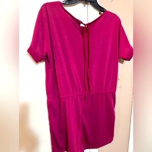 Fuchsia romper with tie in the back. Brand new never worn.